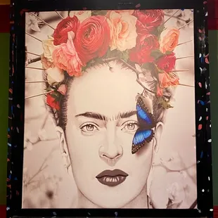 a woman with a butterfly in her hair