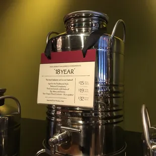 a display of coffee pots and teapots