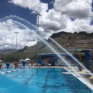 Diving area with water jets spraying.  Beautiful view of the mountains!