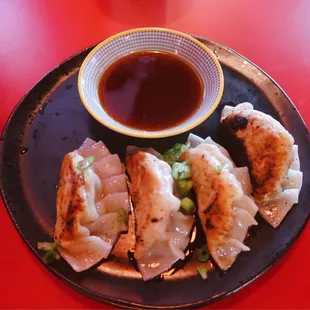 Pan Seared Gyozas: Hand folded Pork dumplings with Ponzu Soy sauce.