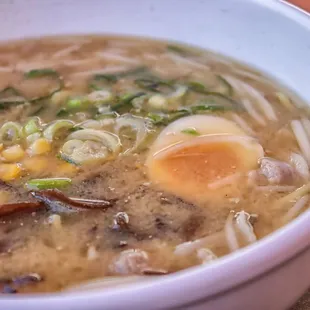 a close up of a bowl of ramen
