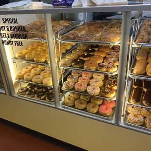 a display case full of doughnuts