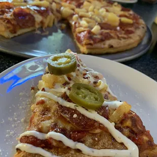 a slice of pizza on a plate