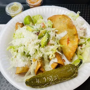 Taquitos and hard shell taco~beef