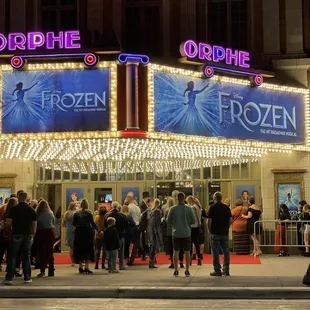 a crowd of people standing outside
