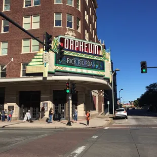 people walking in front of it