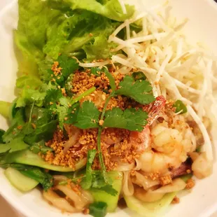 SEAFOOD NOODLES: rice noodles with prawns, squid, fresh vegetables and ground peanuts $14.19+tax