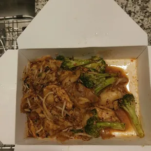 Pad see ew, upon opening the container. Looked like a partial order... Small portions here