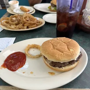 Hamburgers, onion rings and fried cheese