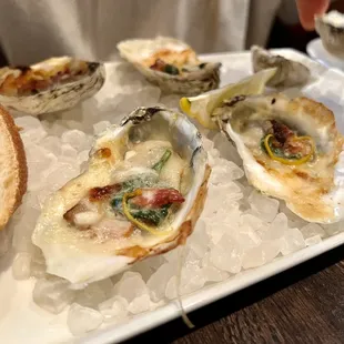 Roasted Oysters - $20 Eden farms bacon, spinach, parmigiano-reggiano