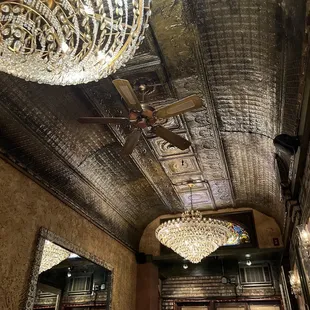 a chandelier hanging from the ceiling