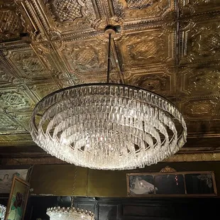 a chandelier hanging from the ceiling