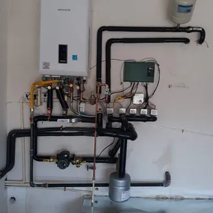 Navian combination waterheater and boiler heating system