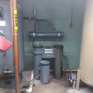 Condensate drain and oil water separator post office