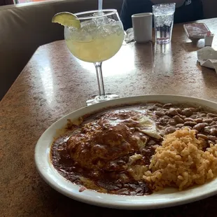 Red enchiladas beans and rice