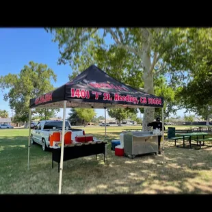 a tent set up in a park