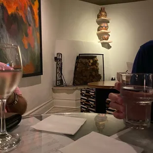 a man holding a glass of wine