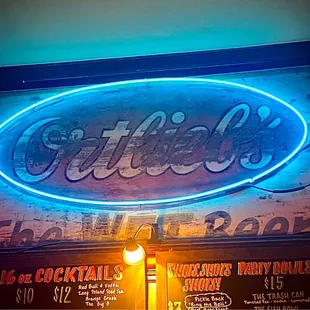 a neon sign for a bar