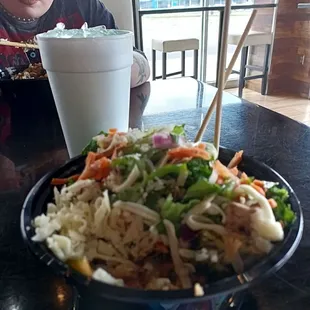 a woman eating a salad