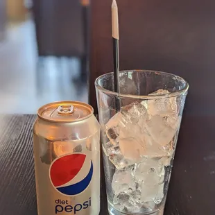 Diet Coke with a glass full of ice