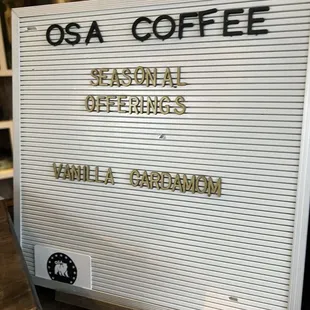 a sign for osa coffee