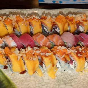 Happy Family roll on the outside and rainbow roll in the middle