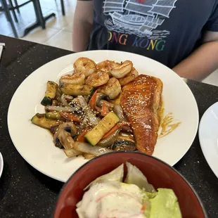 Salmon and Shrimp hibachi plate. Good taste, good size. Came with fried rice.