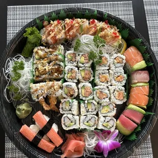 California Roll, Spicy Tuna Roll, Alaska Roll, Spicy Crab Giant Roll, Rainbow Roll, Shrimp Tempura, and Crab Stick Sushi