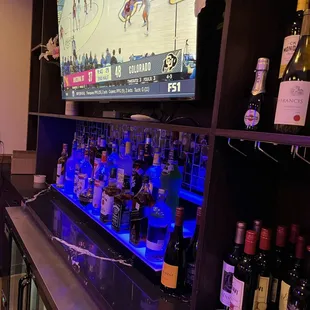 a man watching a game on tv