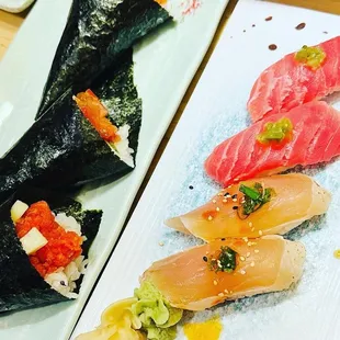 Spicy tuna, spicy salmon hand rolls. Albacore and tuna nigiri.