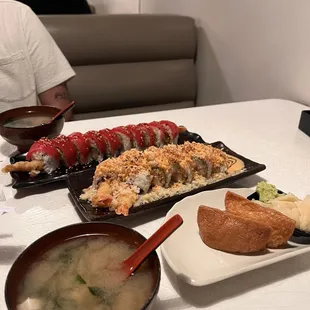 Miso soup, inari, Red Dragon roll, and Shrimp Tempura Crunch roll