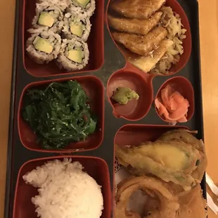 a bento box of food