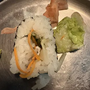 I pulled one piece of lettuce from the vegetable roll, a few carrot strands left