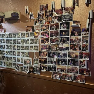 a wall full of photos