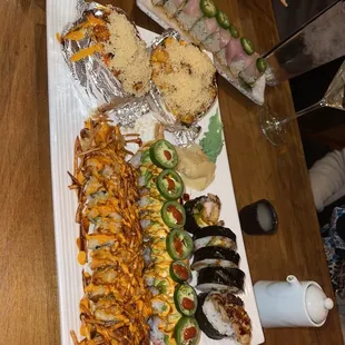 Yellowtail carpaccio, scallop roll, spicy tako, presidential roll, I'm on fire roll, spider roll