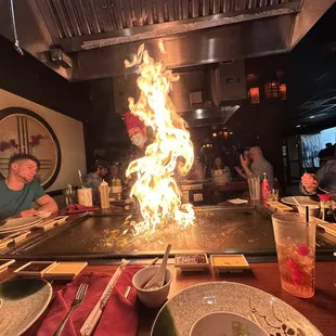 a fire coming out of the grill