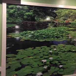 Pretty Japanese garden painting hanging next to the hibachi tables