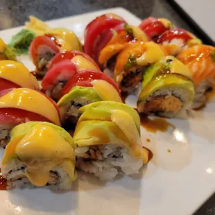 a plate of sushi rolls on a table