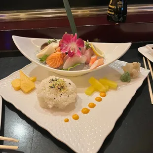 a bowl of sushi and rice