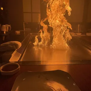 a fire coming out of the grill
