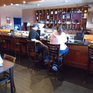 Sushi bar and booze in the front room.