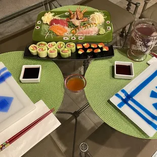 Spicy tuna roll; Naruto roll; sashimi sweet shrimp; salmon; tuna; fresh scallop; and yellowtail jalapeño appetizer.