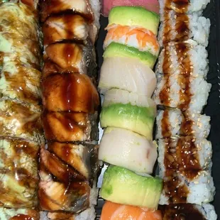 Rainbow roll, dragon roll and torrie roll