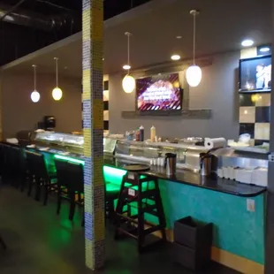 Sushi bar behind the left dining room.