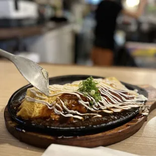 Tonpeiyaki (more of an omelet. Okonomiyaki doesn&apos;t have egg but uses flour instead. A higher protein alternative to a higher carb oko)
