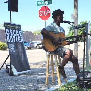 Enjoying listening to Oscar singing in the park.