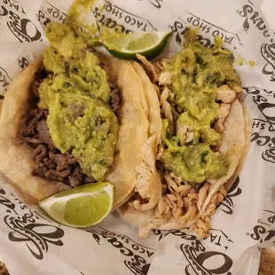 The street tacos  smothered in guacamole