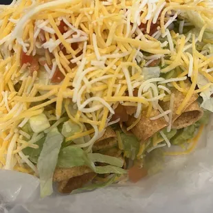 12 of my favorite beef rolled tacos with sour cream, guacamole, and cheese!