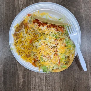 Combo Plate #1 = Taco and Tostada, served with beans and cheese, seasoned rice and a drink for $11.25...get in my belly!