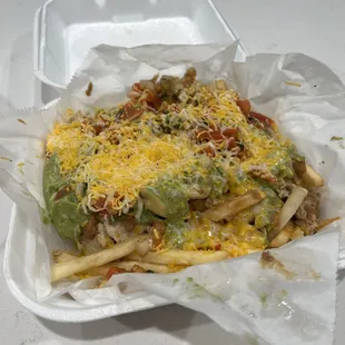 Pollo asada fries, no sour cream, guacamole and added pico de gallo and beans!!